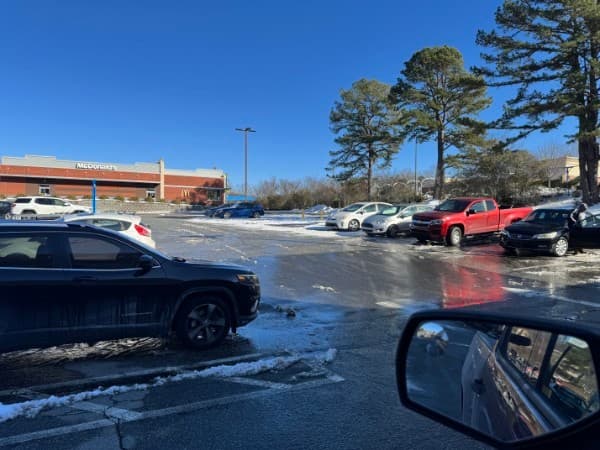 Snow removal on a commercial parking lot in Greensboro, NC